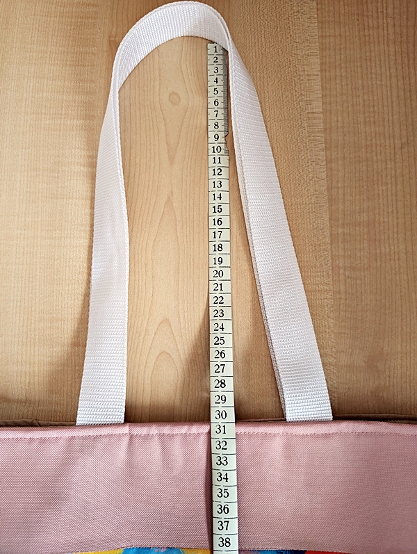 délka ucha k taškám